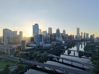 Fototapeta premium Beautiful Austin skyline downtown at sunrise with a stunning aerial drone view