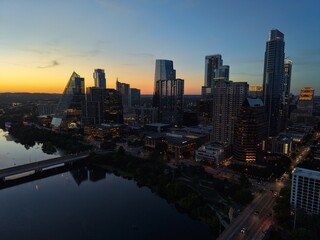 Fototapeta premium Beautiful Austin skyline during sunset with a stunning aerial drone view 