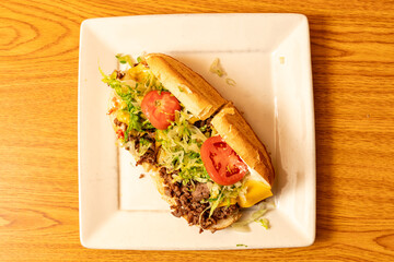 Cheesesteak hoagie on a plate
