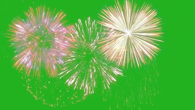 Blasting of fireworks in the sky on green screen