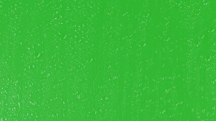 Dripping of water drops on a glass board with green screen background - Powered by Adobe