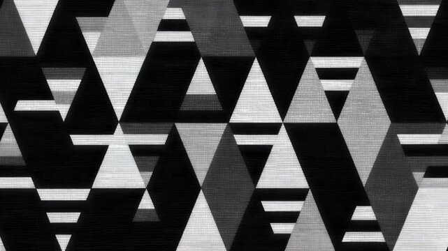 Monochrome geometric pattern animation with triangles and rectangles. Black and white abstract shapes in motion. Minimalist design for visual effects or backgrounds.