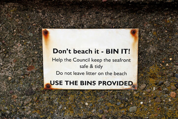 Old Keep The Beach Clean Sign at a Coastal Location