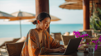 Remote work at tropical beachside with laptop and coffee