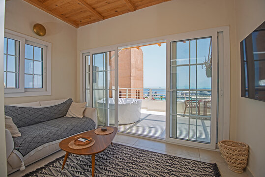 Interior design of luxury apartment living room with patio