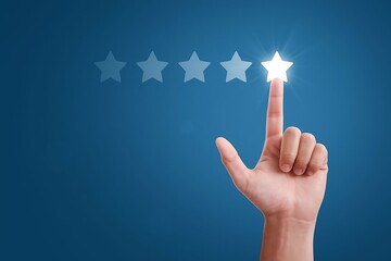 Hand touching glowing star for five star rating on blue background