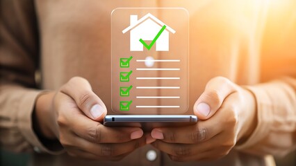 Person holding smartphone displaying a digital checklist with a house icon and checkmarks