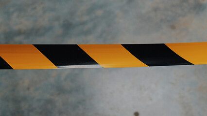 Caution tape indicates restricted area in construction zone