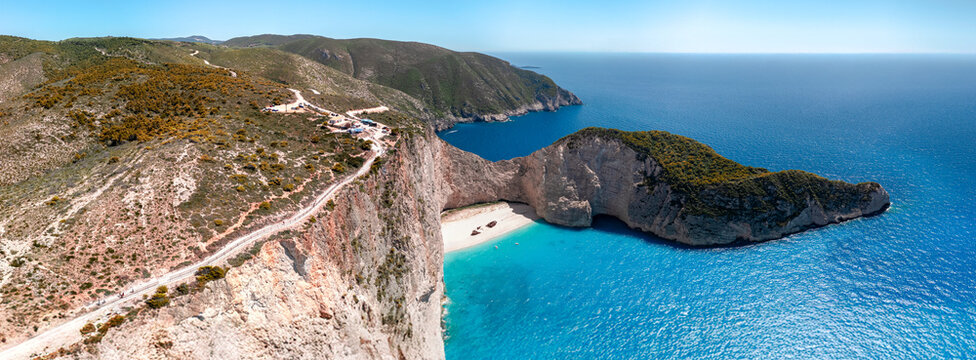 Aerial Panoramic View of Navagio Beach (Shipwreck Beach) in Zakynthos, Greece &ndash; Stunning Cliffs, Turquoise Waters, and Iconic Shipwreck Surrounded by the Ionian Sea