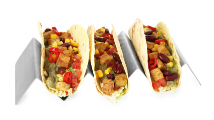 Tasty vegetarian tacos with beans, tofu, vegetables and guacamole isolated on white