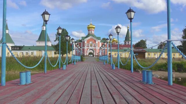 View of the Valdai Iversky Bogoroditsky svyatoozersky monastery. Sunny June day . Russia,Ancient Russian Iversky Monastery at Valdaysky National Park.