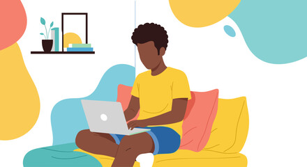 Young man working on laptop from home, perfect for remote work, freelance, and work-life balance concepts.