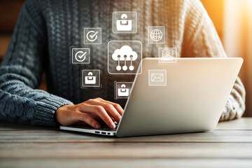Person using laptop with digital cloud and network icons