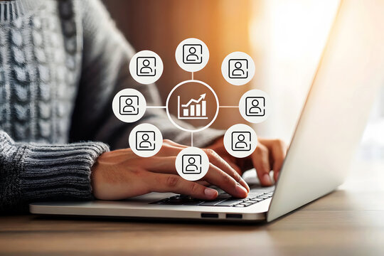 Person using laptop with network of people icons and graph