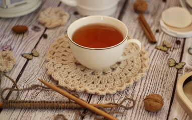 Cup of tea doily decor design crochet knitting woman's objects things on table cozy photo 