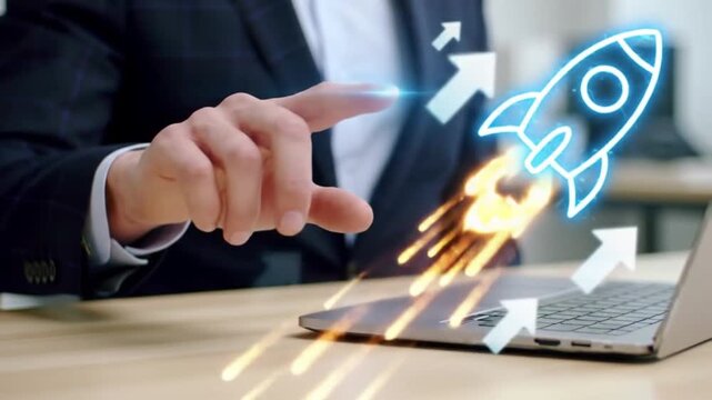 Businessman Interacts with Holographic Rocket Launching from Laptop Technology Growth 168 characters