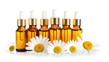 Amber glass bottles of liquid with chamomile flowers