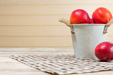 Ripe Nectarines in Rustic Metal Bucket