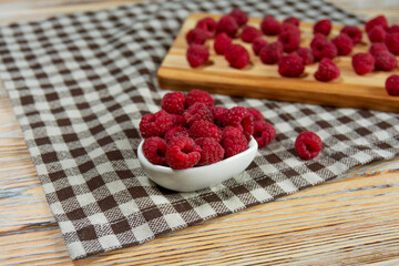 Bowl of Fresh Raspberries on Rustic Cloth