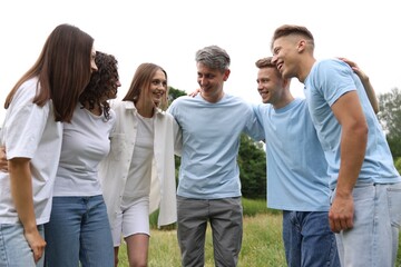 Fototapeta premium Team building. Group of happy people together outdoors