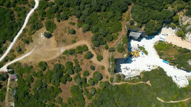 Ancient Roman quarry Cave Romane near Pula, Croatia &ndash; historic stone site surrounded by forest, dramatic rock formations