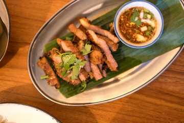 Grilled beef with with spicy dipping sauce, Thai called jaew sauce. Northeastern Thai food
