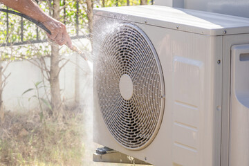 air conditioning compressor outdoor unit cleaning service with water spray