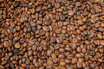 Fresh premium roasted brown Arabica coffee beans background