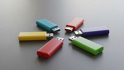 Colored USB drives forming circle representing digital collaboration, knowledge sharing, and teamwork concept in business setting