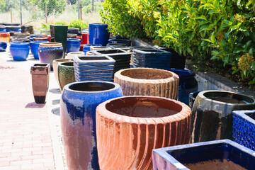  Glossy ceramic pots in various colors and textures