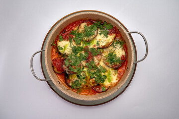 Delicious Baked Vegetable Dish Topped with Cheese and Fresh Herbs, Perfect for a Healthy and Flavorful Meal Option to Satisfy Any Palate