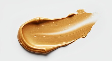 Gold gloss cosmetics swatches on a white background. Abstract golden swatch for makeup, beauty and luxury concept ideal for cosmetic promotion, cosmetic blog or makeup ad.