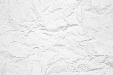 Crumpled paper texture background. White abstract wrinkled paper surface with creases and folds for a rough grunge pattern or backdrop.