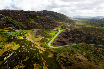Aerial View of Cars Driving on a Winding Mountain Road in Donegal