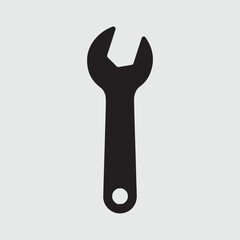 Black silhouette of a single open end wrench on a light gray background
