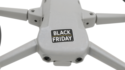 Black friday drone: top view of discount sticker on modern gray tech device