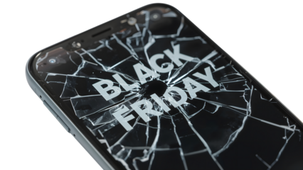 Shattered smartphone screen displaying black friday message: discounts come with consequences