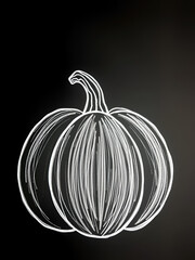 A bright chalked drawing of a pumpkin for Halloween