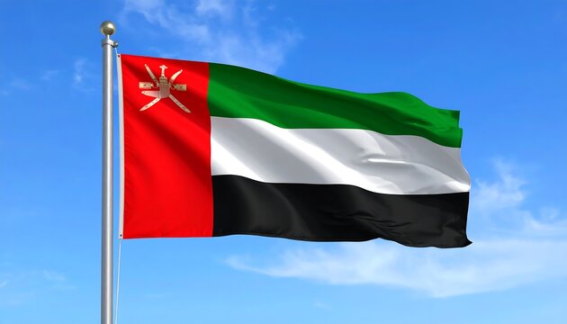 National flag of Oman waving proudly against a clear blue sky - Powered by Adobe
