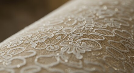 Closeup of white floral lace overlay on a textured fabric