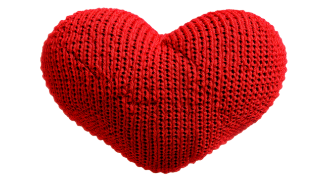 Heart shaped crochet pillow with vibrant red color for decoration