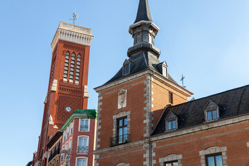 Fototapeta premium Madrid, Spain. View of the twin towers of the 17th century Palacio de Santa Cruz, a former royal prison and early Baroque building now housing the Ministry of Foreign Affairs of Spain