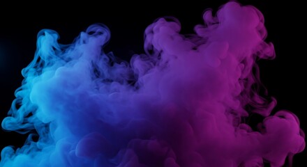 Obraz premium Abstract colorful smoke cloud isolated on black background a vibrant blend of blue and purple hues perfect for visual effects and artistic compositions