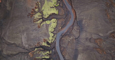 Fiji, Tana Island: Aerial view capturing a river winding through the volcanic landscape of Port...