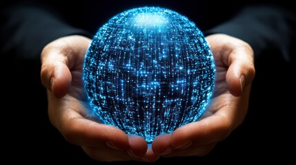 Glowing orb held in hands against dark background