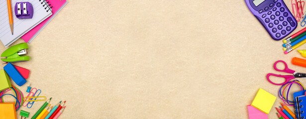 School supplies double border. Above view on a brown paper banner background. Copy space. Back to...