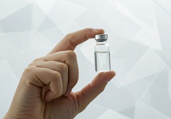 Hand Holding a Clear Vial of Liquid Medicine