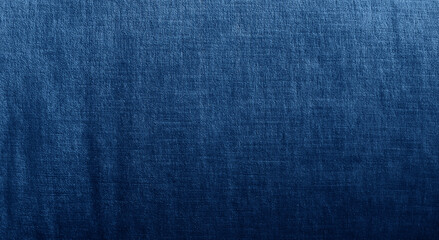 Blue fabric texture background with subtle sheen. Elegant textile surface for design, fashion, upholstery, or abstract backdrop. High-quality natural fibers. close up fabric texture.
