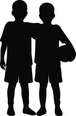 Silhouette of two young boys, friends, with a soccer ball
