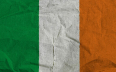 Wrinkled Irish Tricolor Flag Fabric Background Texture With Rich Green White Orange Colors